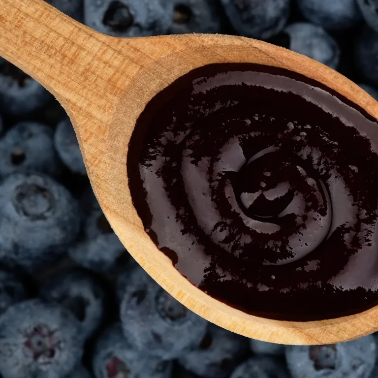 Blueberry purée on a spoon — Concord Wholesale