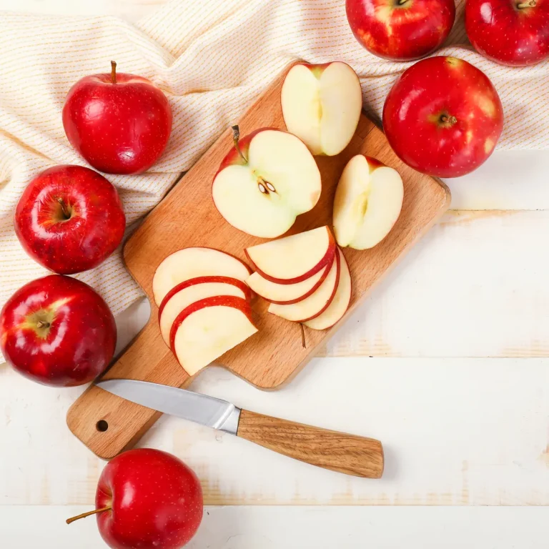 IQF-style apple slices on a cutting board — Concord Wholesale